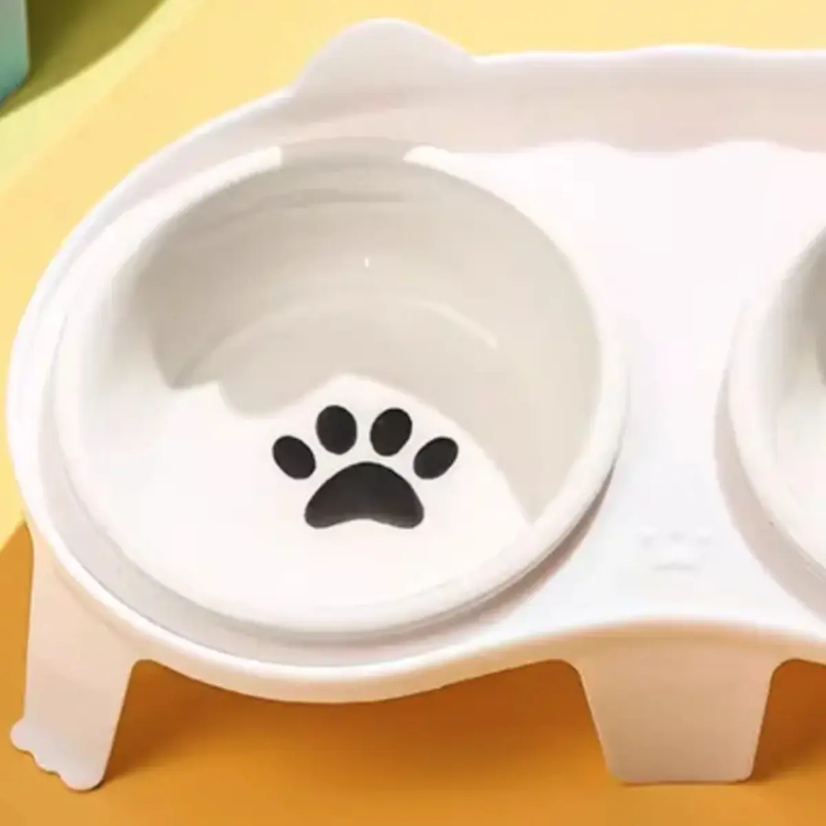 Double cat bowl on raised stand for food and water